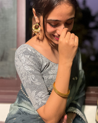 Model pairing the blouse with a saree, demonstrating a festive-ready ensemble.
