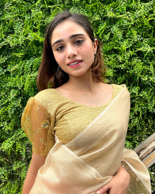 Model paired with a saree for a festive-ready look.
