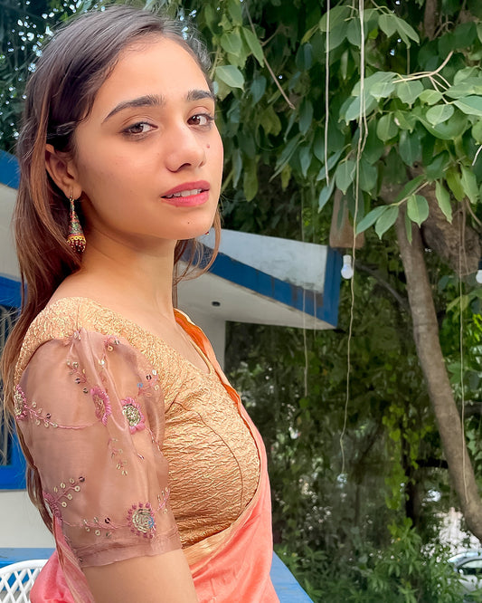 Model paired with a saree for a festive-ready look.