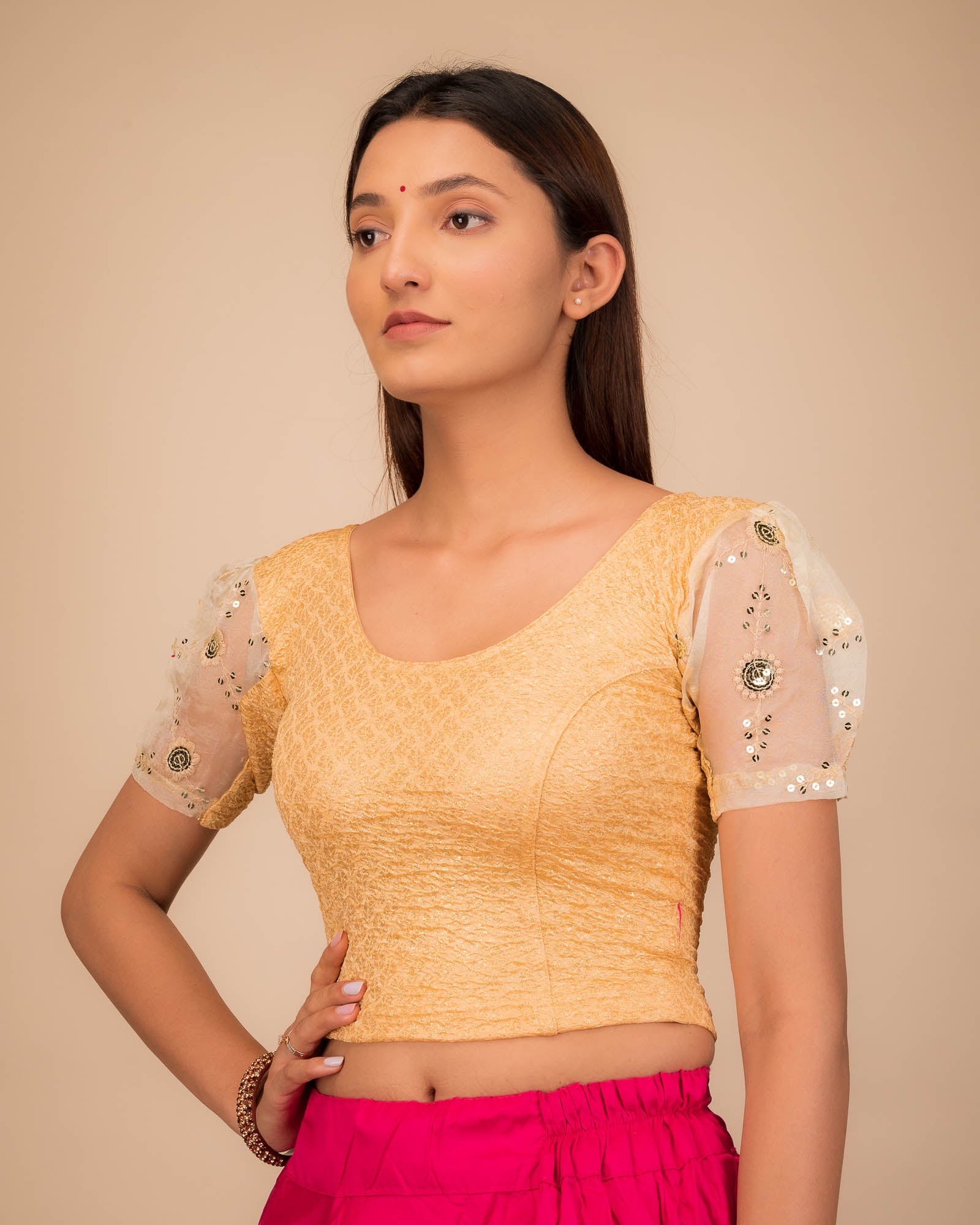 Side profile highlighting sleeve volume and fit.