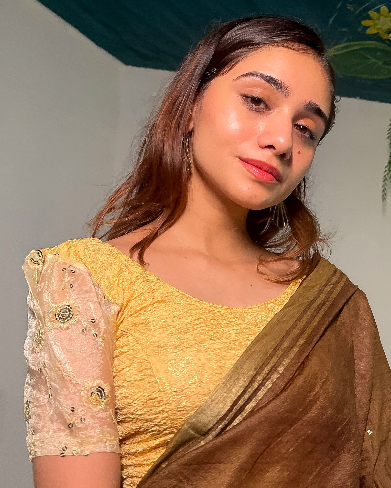 Model paired with a saree for a festive-ready look.