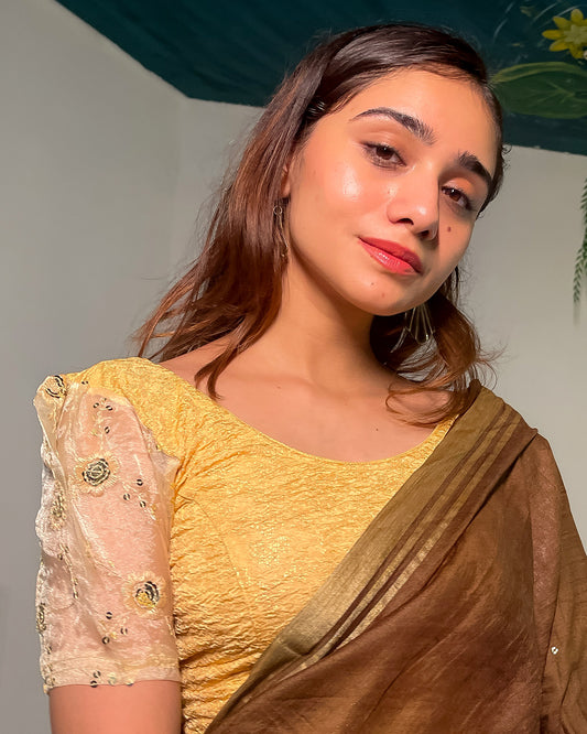 Model paired with a saree for a festive-ready look.