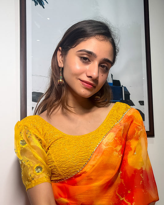 Model paired with a saree for a festive-ready look.