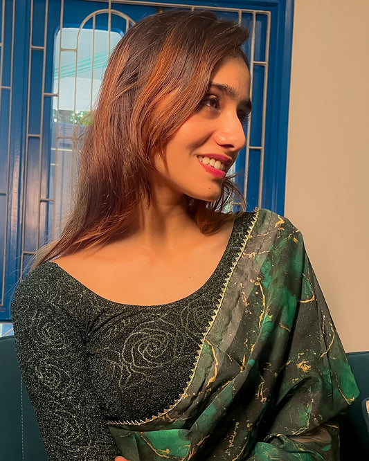 Model pairing the blouse with a saree for a festive ensemble.