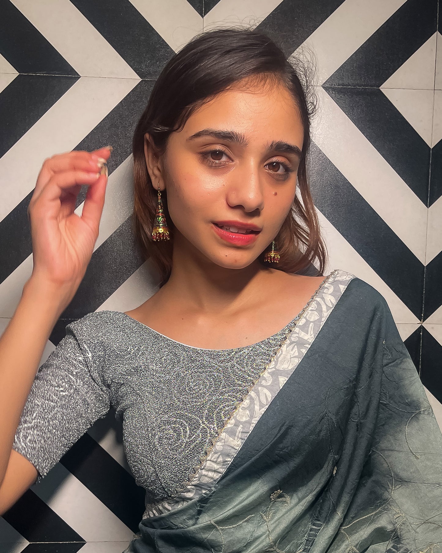 Model pairing the blouse with a saree for a festive ensemble.
