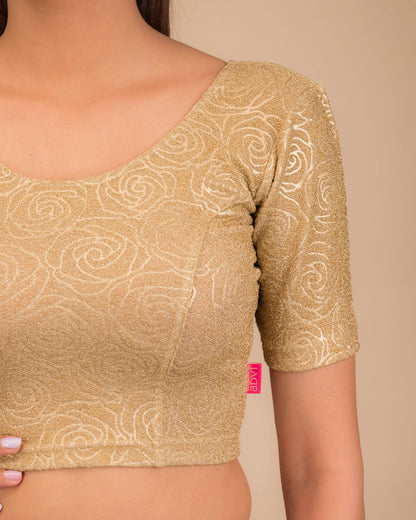 Close-up of the lurex knit fabric with embossed texture.