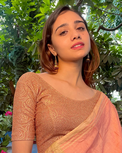 Model pairing the blouse with a saree for a festive ensemble.