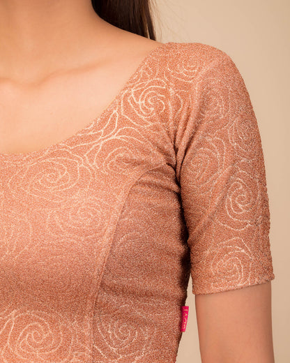 Close-up of the lurex knit fabric with embossed texture.