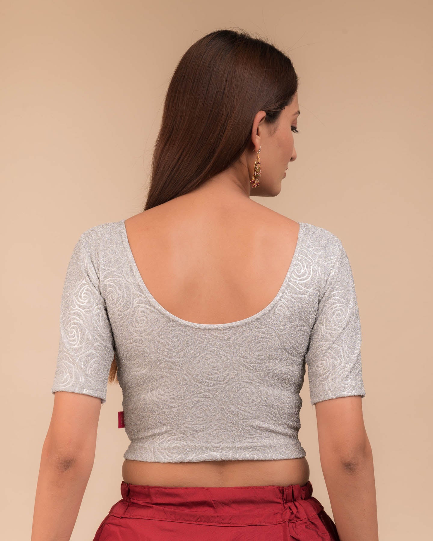Rear view of the stretchable blouse showcasing the back design.