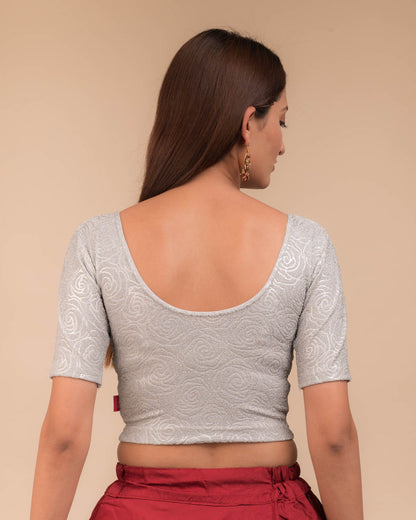 Rear view of the stretchable blouse showcasing the back design.