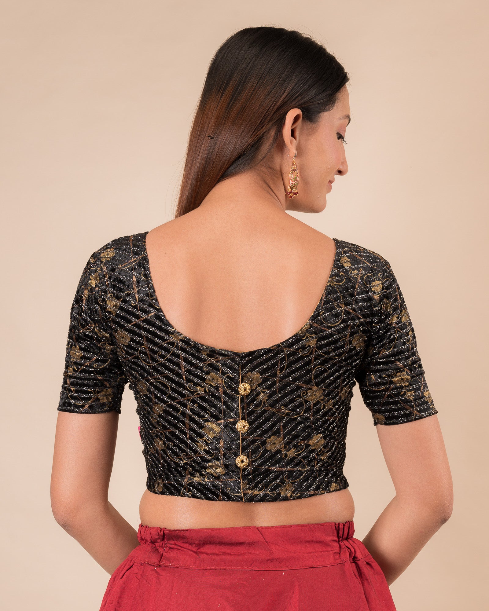 Rear view showcasing the button-back detail.