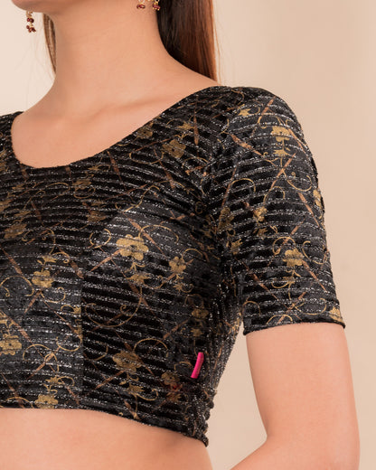 Close-up of velvet fabric with metallic stripe texture