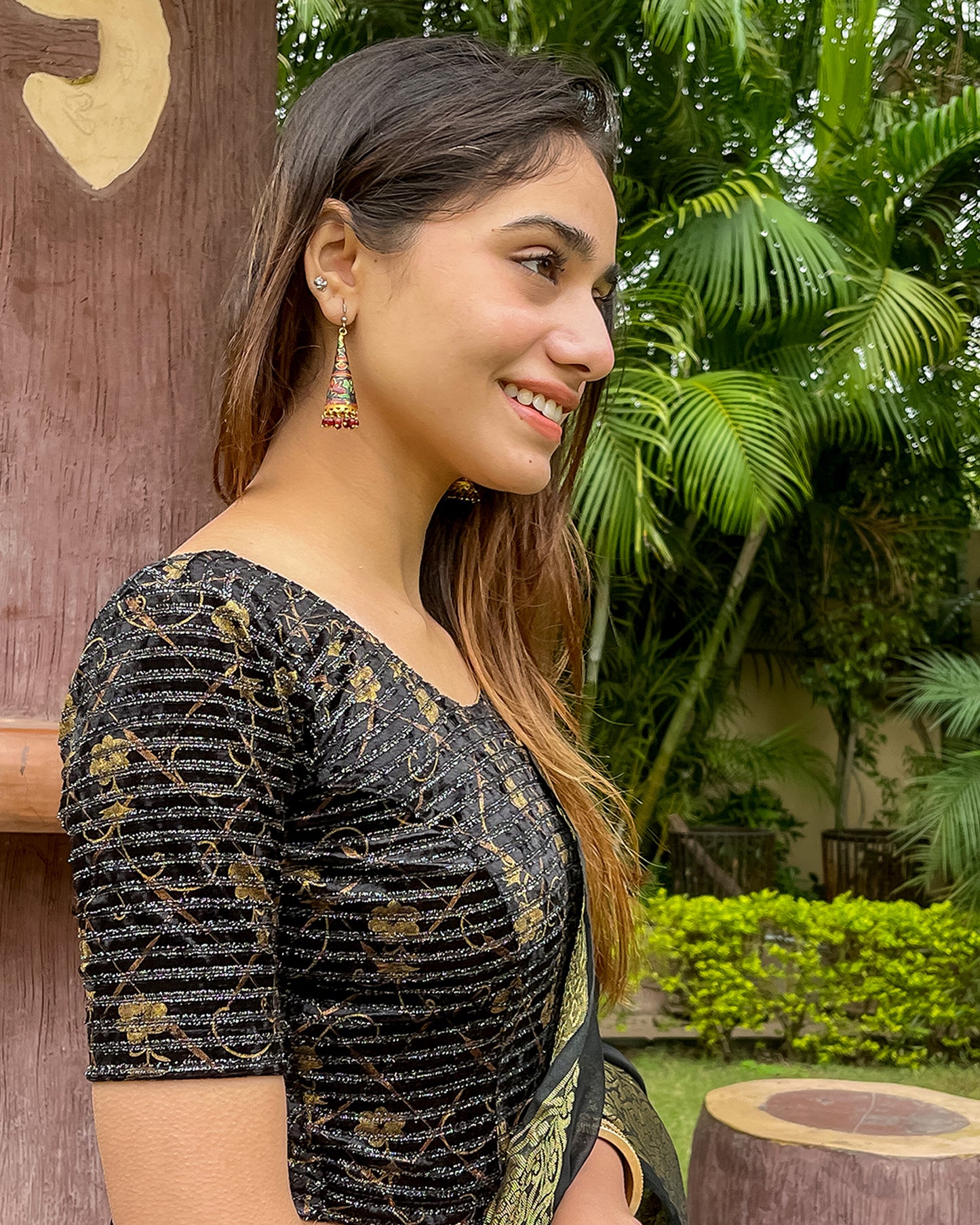 Model pairing the blouse with a saree, demonstrating a festive-ready ensemble.