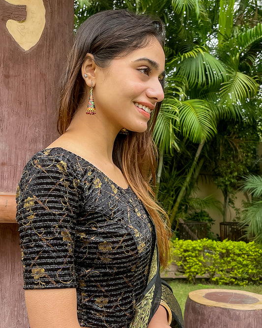 Model pairing the blouse with a saree, demonstrating a festive-ready ensemble.