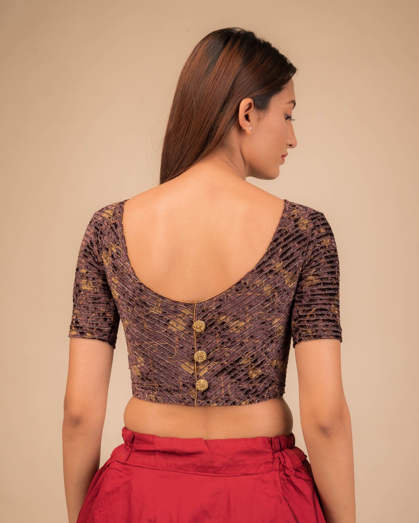 Rear view showcasing the button-back detail.