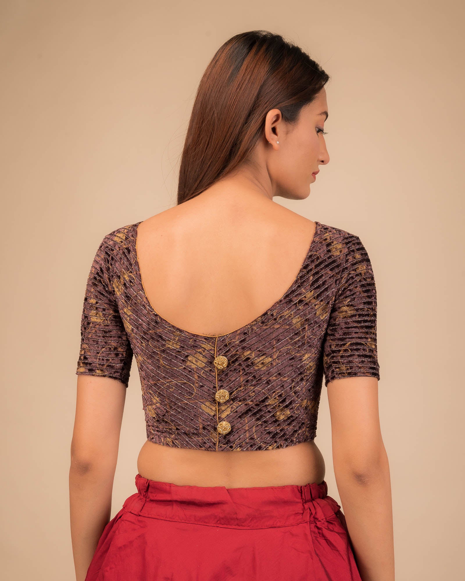 Rear view showcasing the button-back detail.