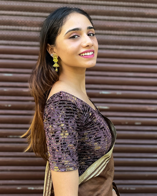 Model pairing the blouse with a saree, demonstrating a festive-ready ensemble.