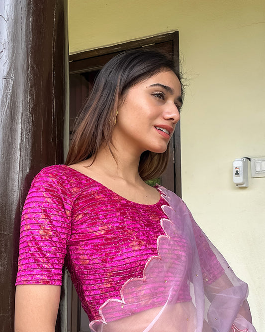Model pairing the blouse with a saree, demonstrating a festive-ready ensemble.