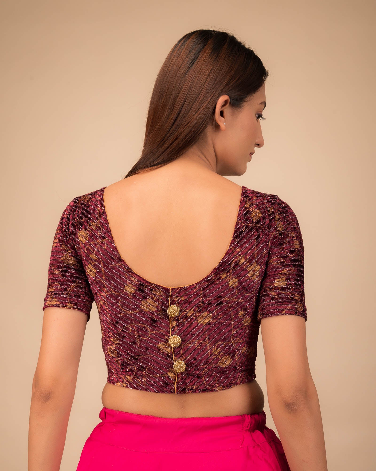 Rear view showcasing the button-back detail.