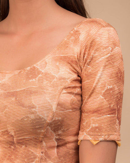 Close-up of jacquard fabric detailing the print and trims.
