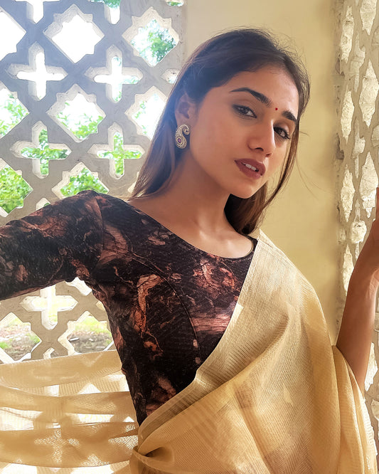 Model pairing the blouse with a saree for a festive-ready look.