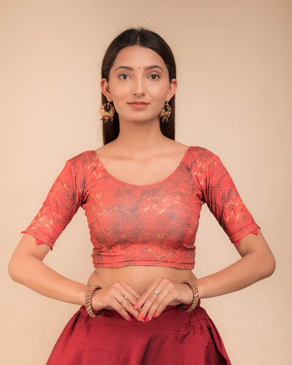 Model wearing a stretchable readymade blouse with elbow sleeves and round neckline, showcasing marbling print.