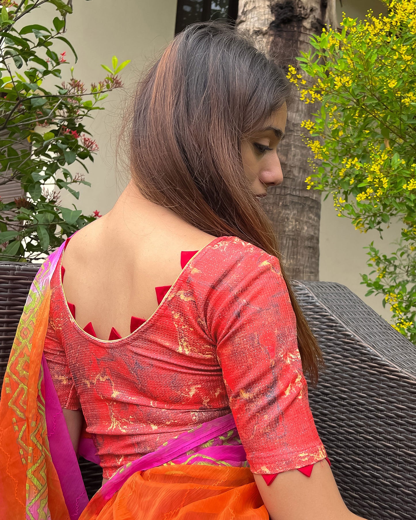 Model pairing the blouse with a saree for a festive-ready look.