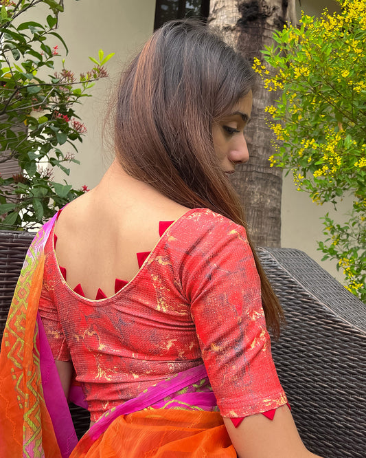 Model pairing the blouse with a saree for a festive-ready look.