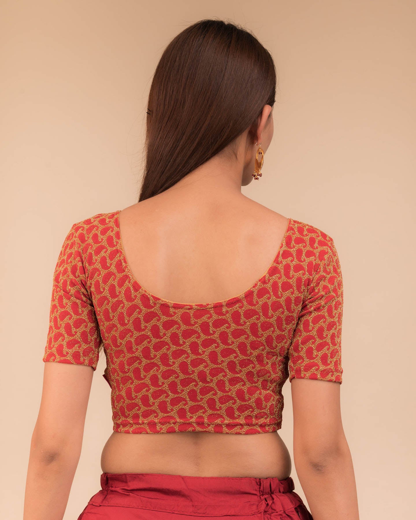 Rear view of the blouse showcasing the back design.
