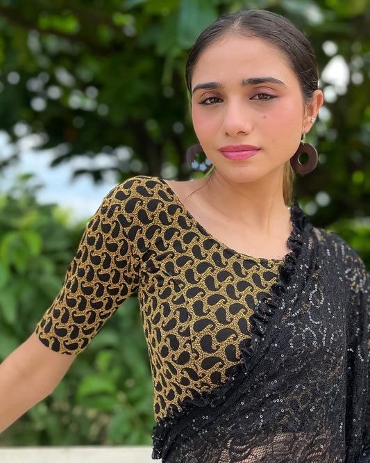 Model pairing the blouse with a saree for a festive look.