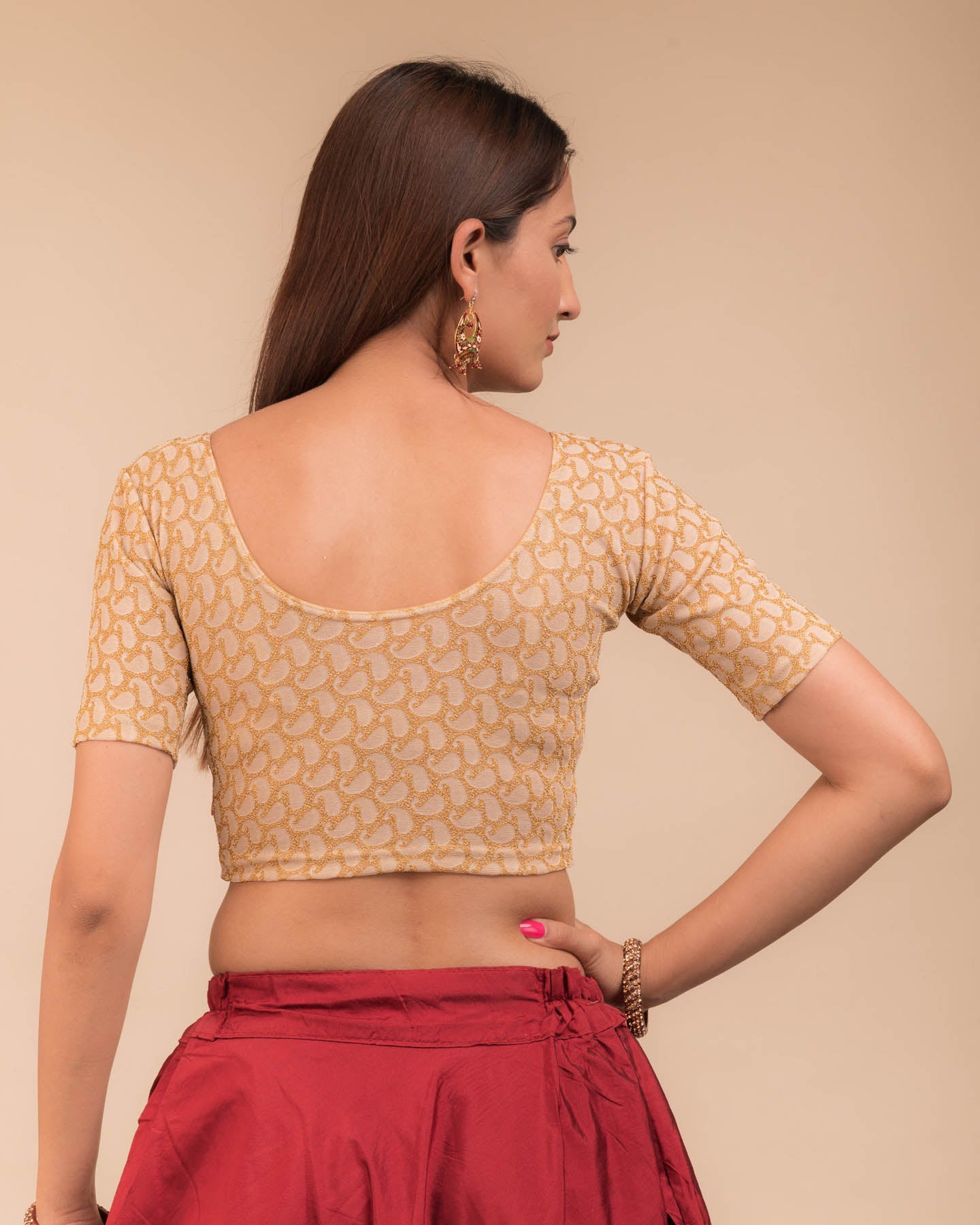 Rear view of the blouse showcasing the back design.