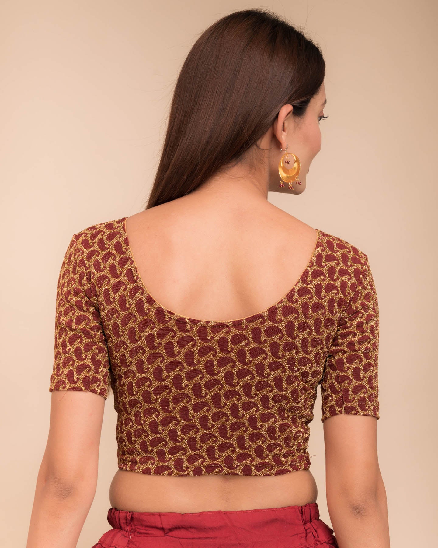 Rear view of the blouse showcasing the back design.