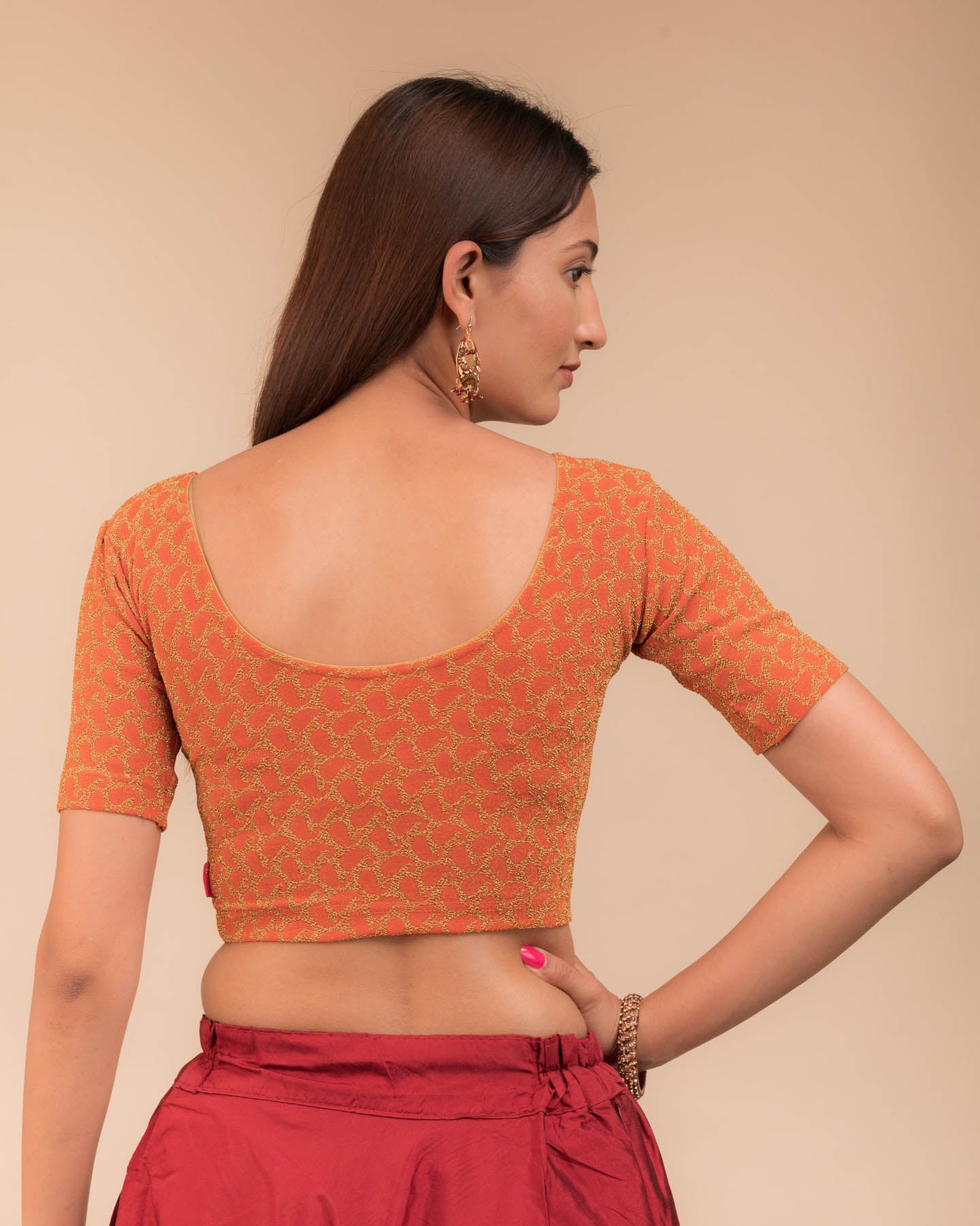 Rear view of the blouse showcasing the back design.
