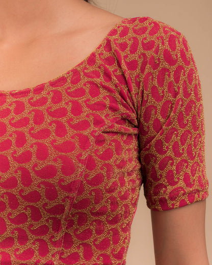 Close-up of jacquard fabric with zari pattern.