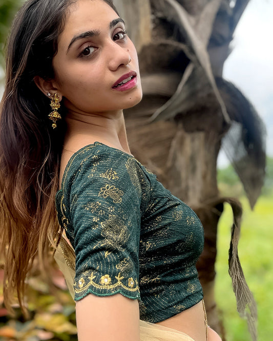Model pairing the blouse with a saree for a festive-ready look.
