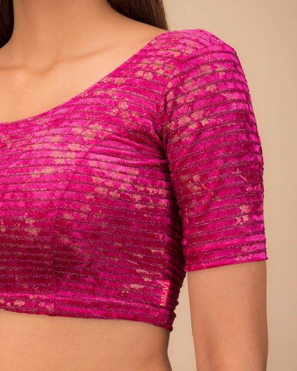 Close-up of the velvet fabric with metallic foil accents.