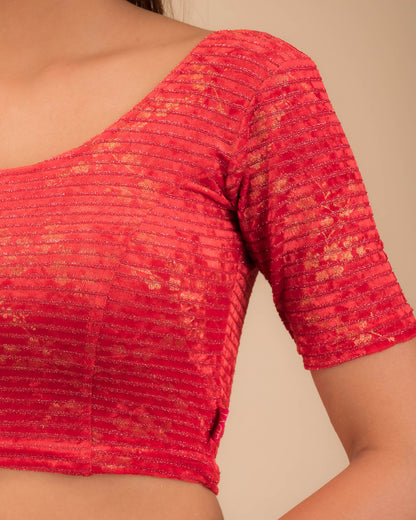 Close-up of the velvet fabric with metallic foil accents.