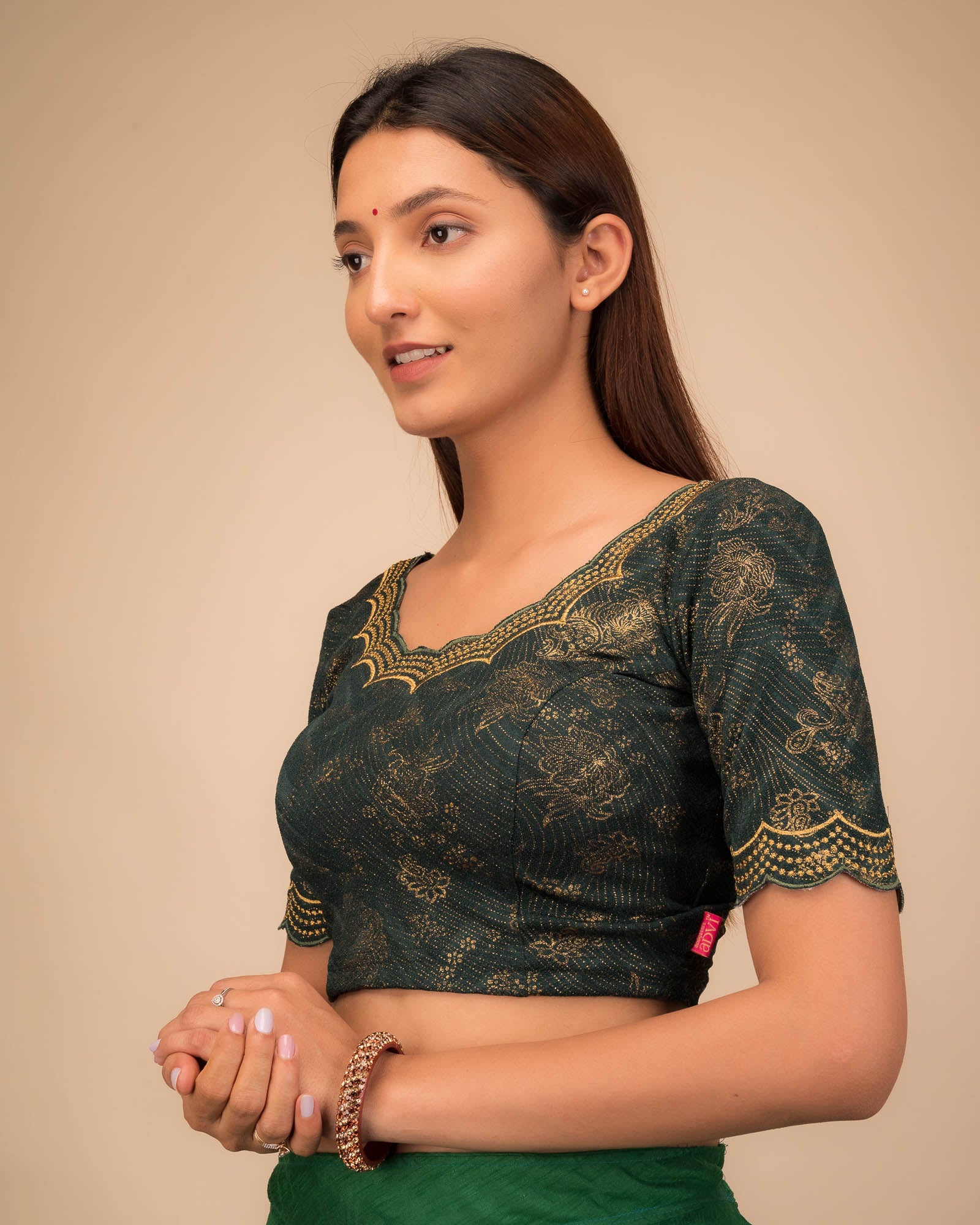 Side profile highlighting fit and sleeve length.
