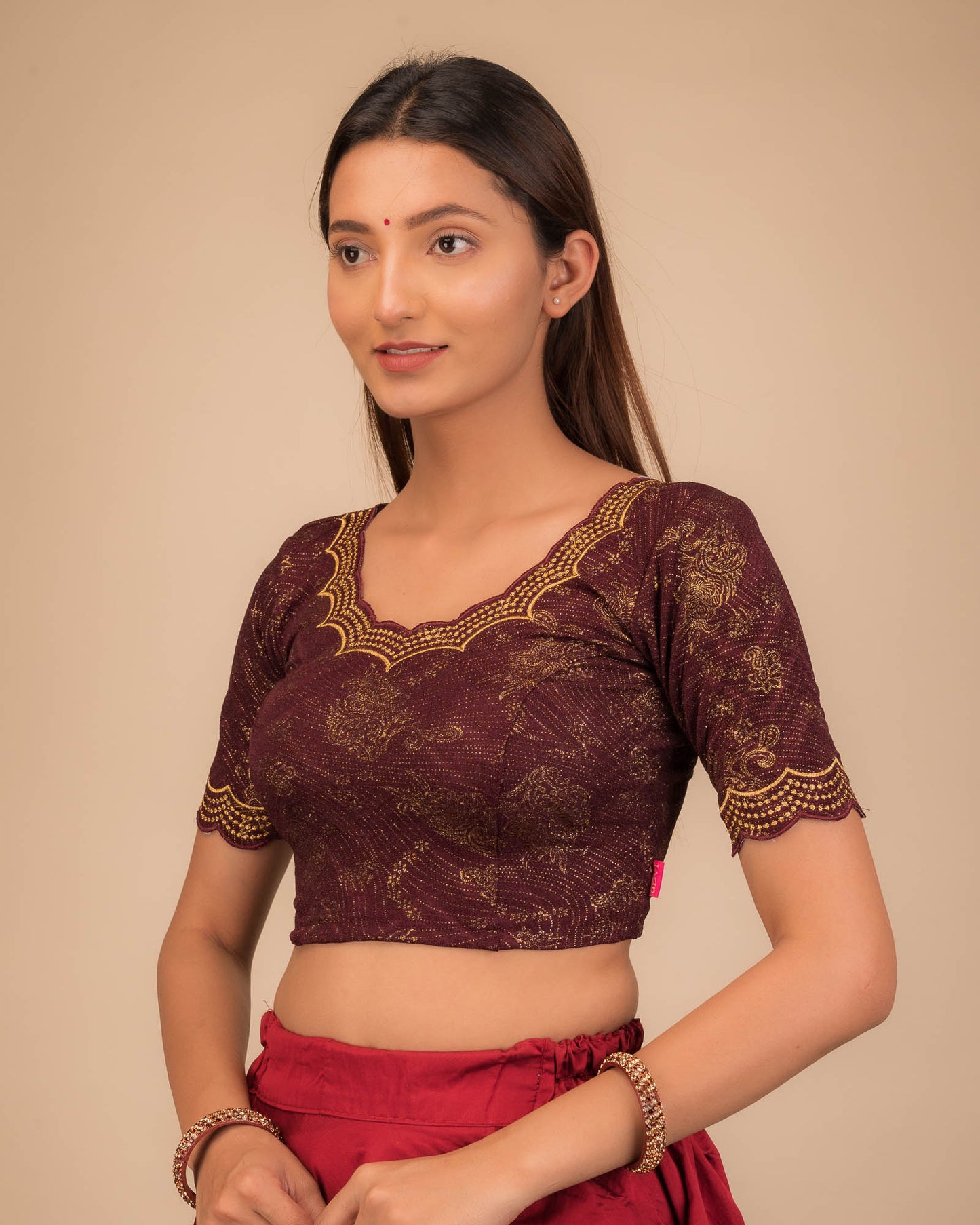 Side profile highlighting fit and sleeve length.