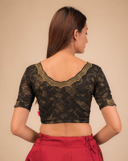 Rear view showcasing the blouse’s back design.