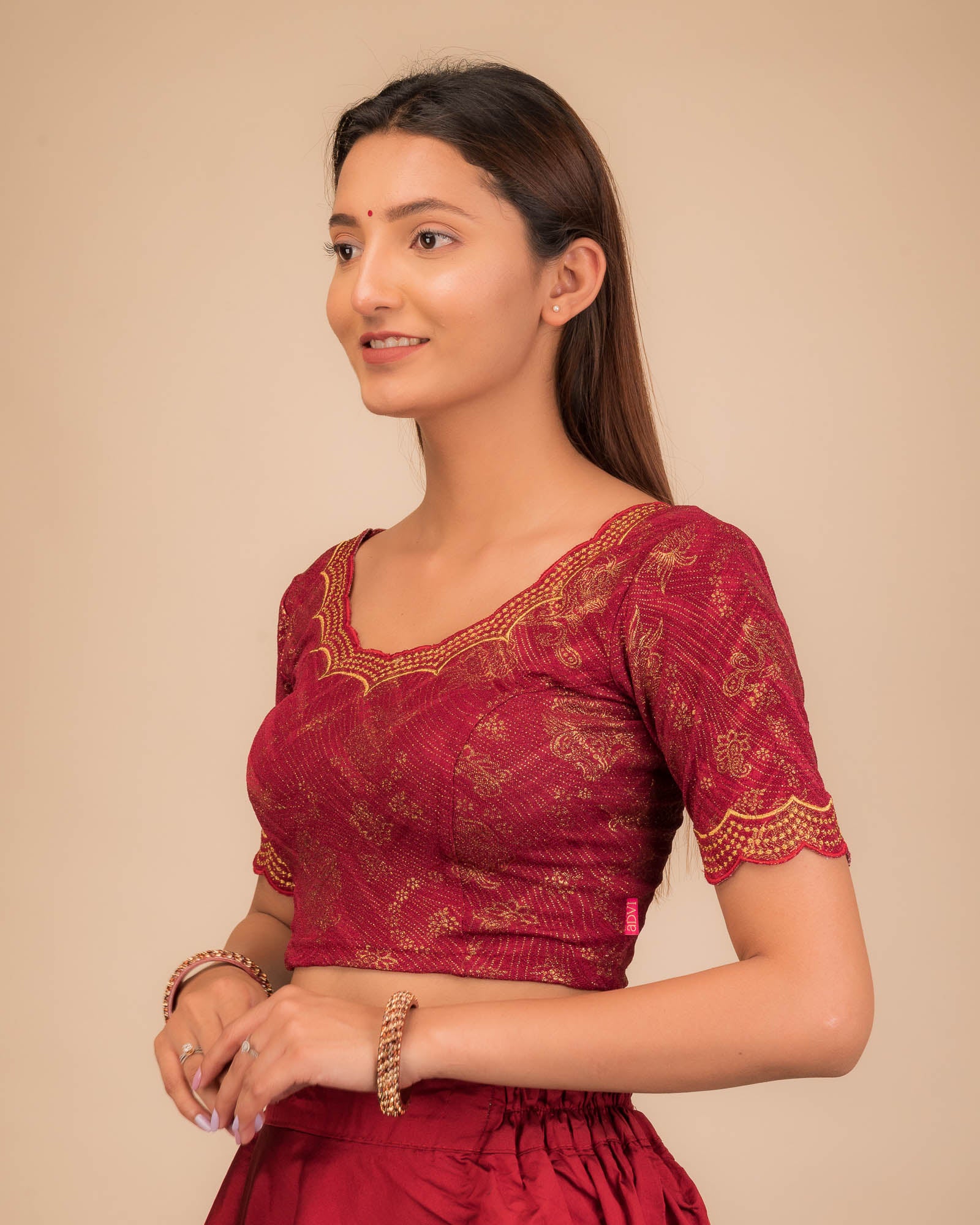 Side profile highlighting fit and sleeve length.
