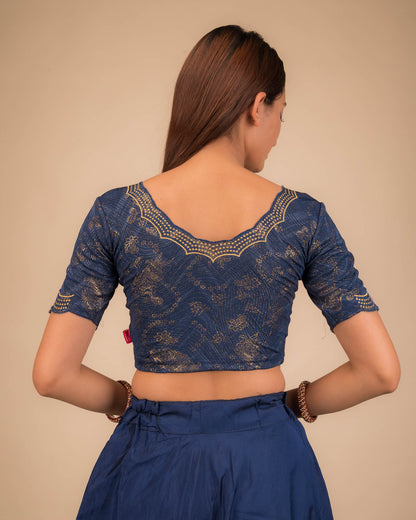 Rear view showcasing the blouse’s back design.