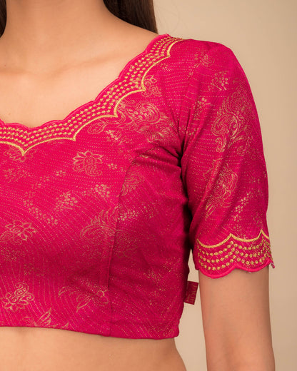 Close-up of jacquard fabric detailing the intricate embroidery and stones.