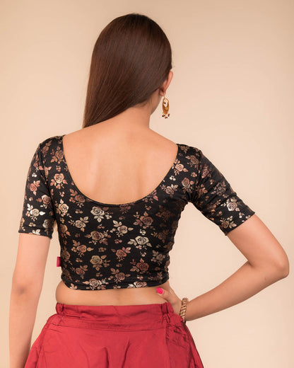 Rear view showcasing the blouse’s back design.