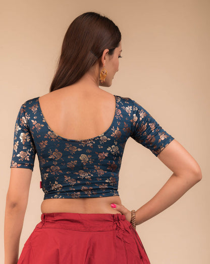 Rear view showcasing the blouse’s back design.