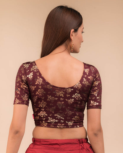 Rear view showcasing the blouse’s back design.