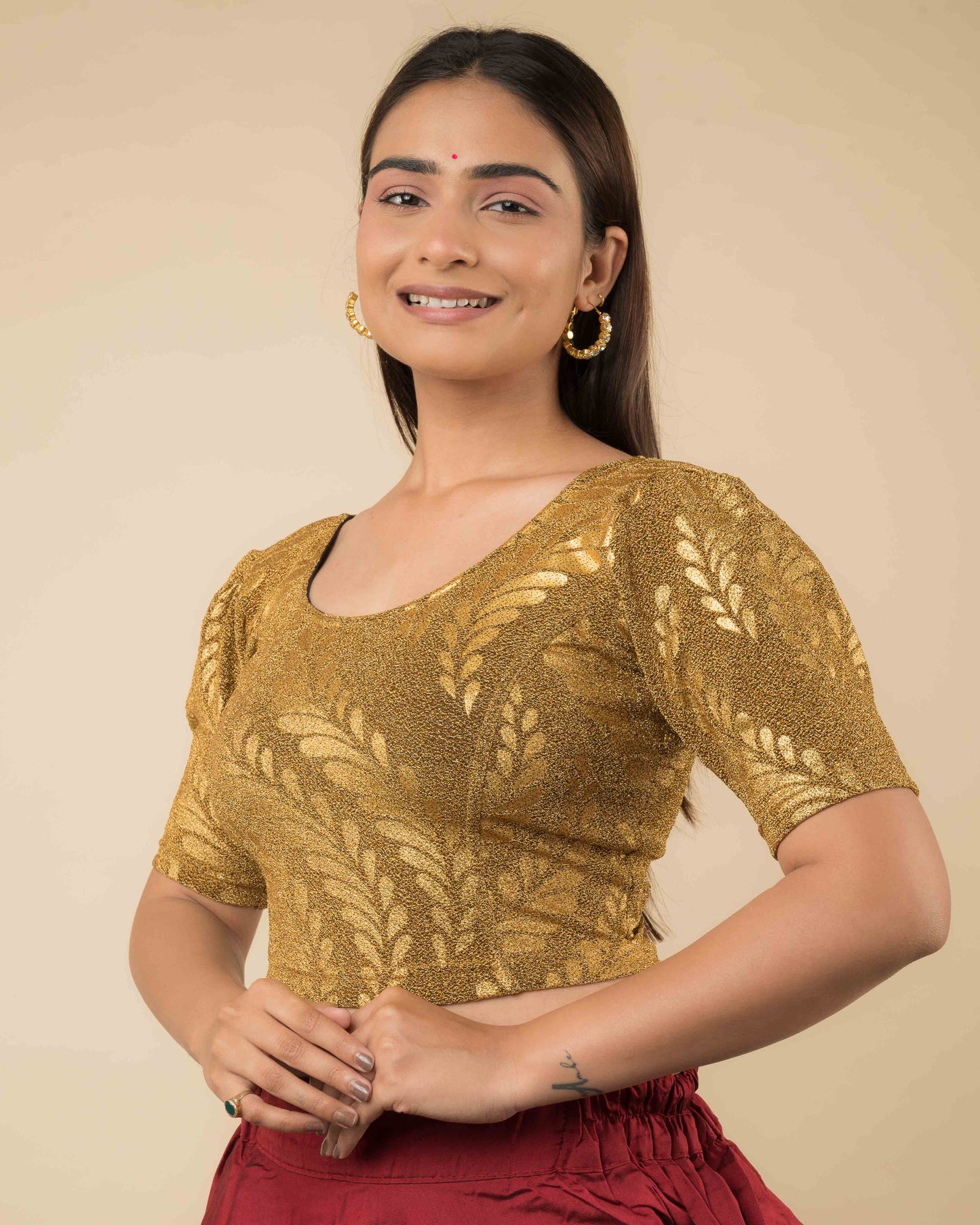 Side profile of metallic zari stretchable blouse highlighting fit, rose print design, and sleeve structure.
