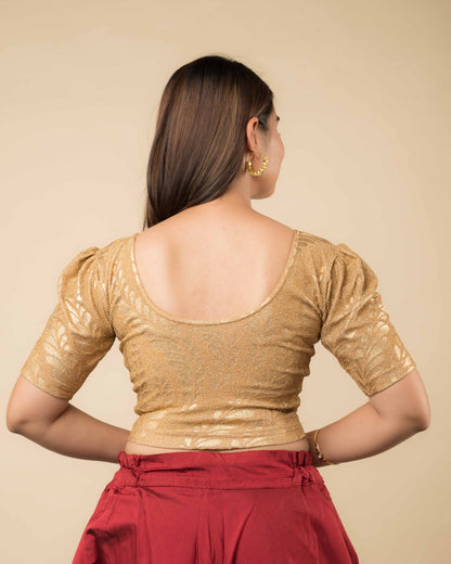 Rear view of metallic zari blouse with rose print showing fit and rose pattern detailing.