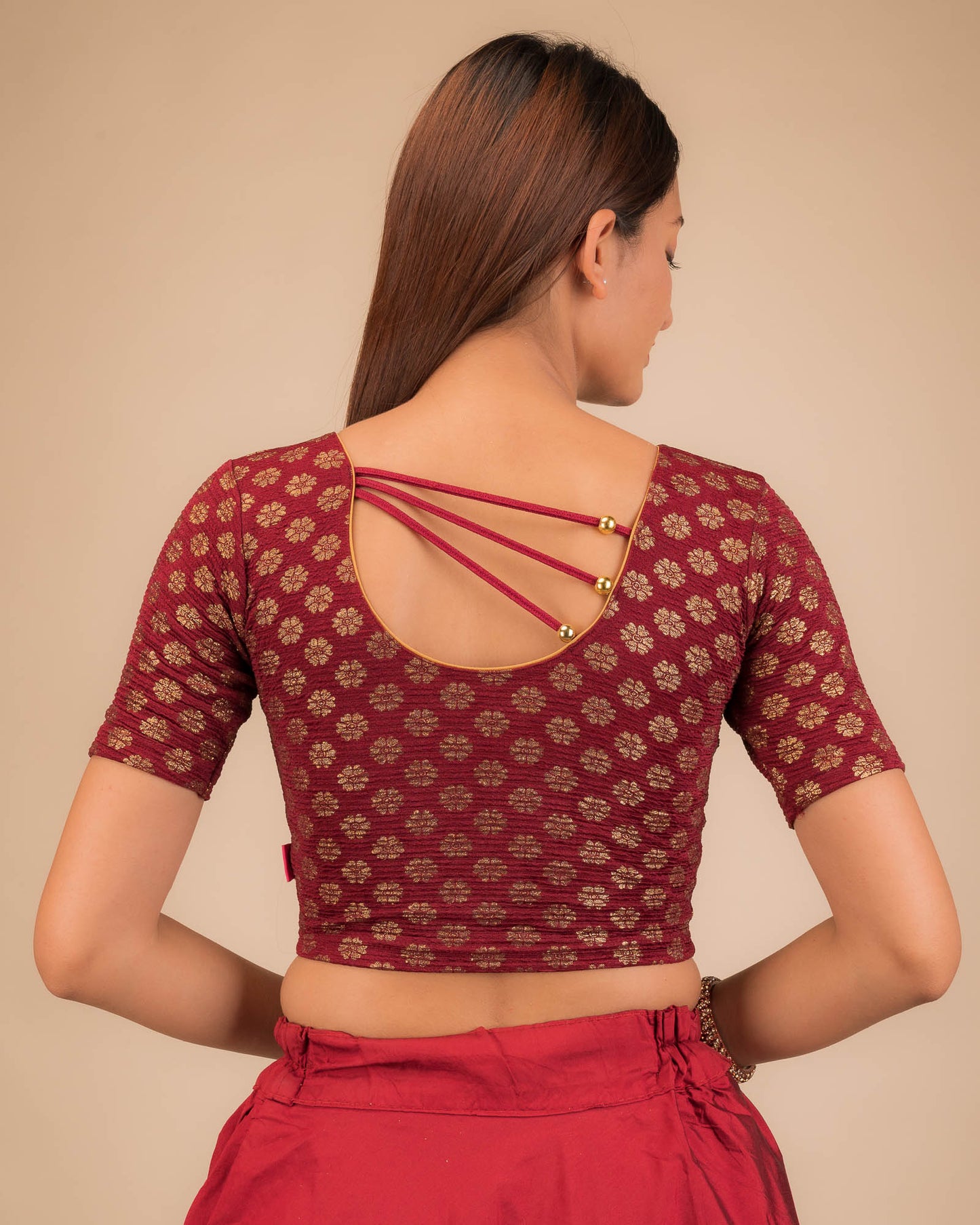 Rear view showcasing pearl accents at the back.