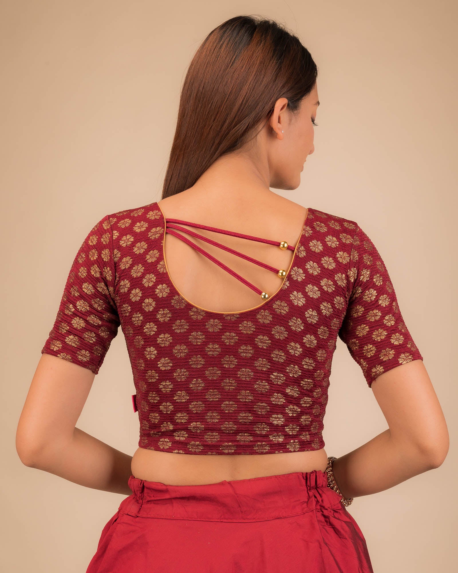 Rear view showcasing pearl accents at the back.
